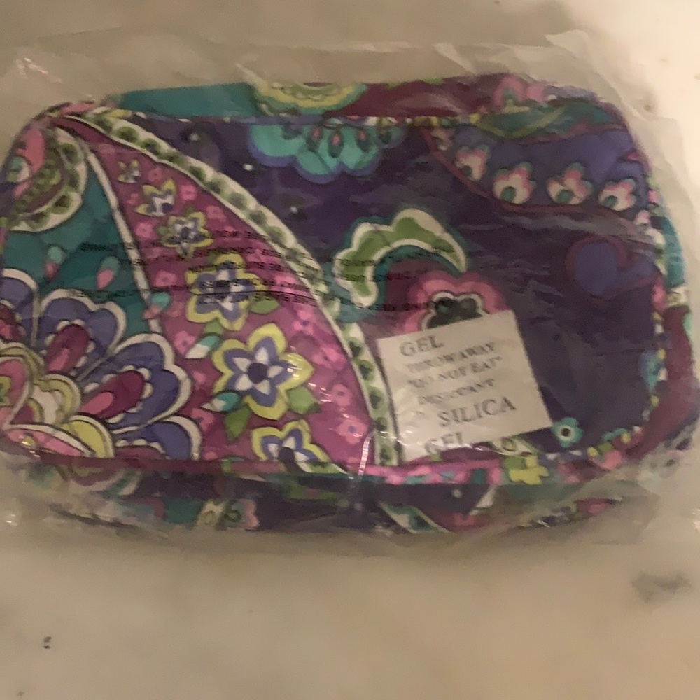 Vera Bradley blush and brush make up bag.